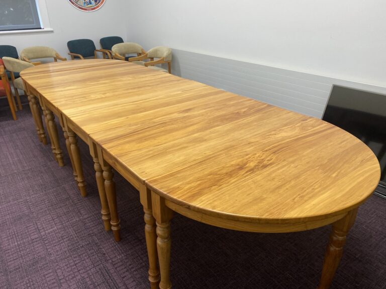 Boardroom table that has been restored and repolished by Kilmister Furniture Restoration.