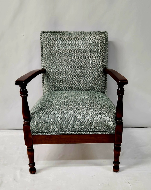 Chair that has been repolished by Kilmister Furniture Restoration and reupholstered by Kelly's Upholstery.