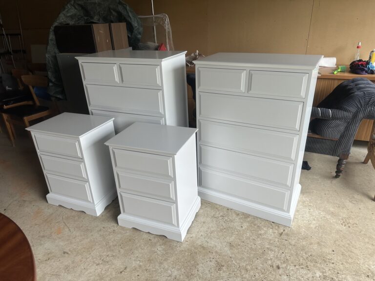Upcycled drawers that have been painted white.