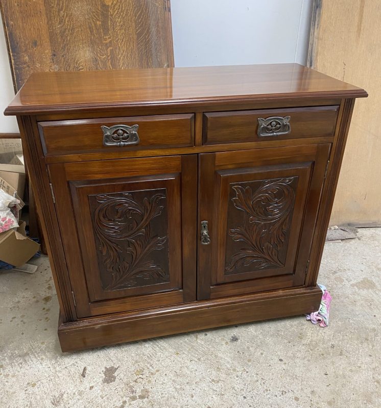 Sideboard furniture with intricate design that has been French polished by Kilmister Furniture Restoration.